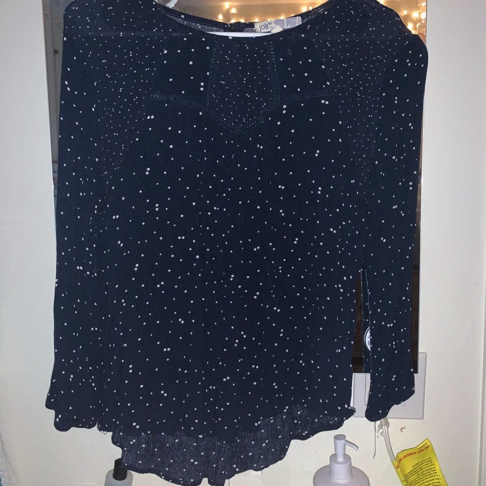 Dark blue long sleeve, white polka dots